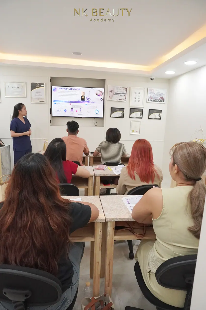 Students at the training benches during a class at NK Beauty Academy