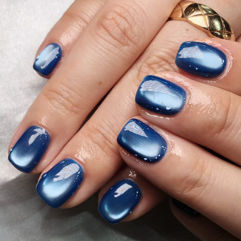 Nail work at NK Beauty: Navy cat-eye gel on short nails