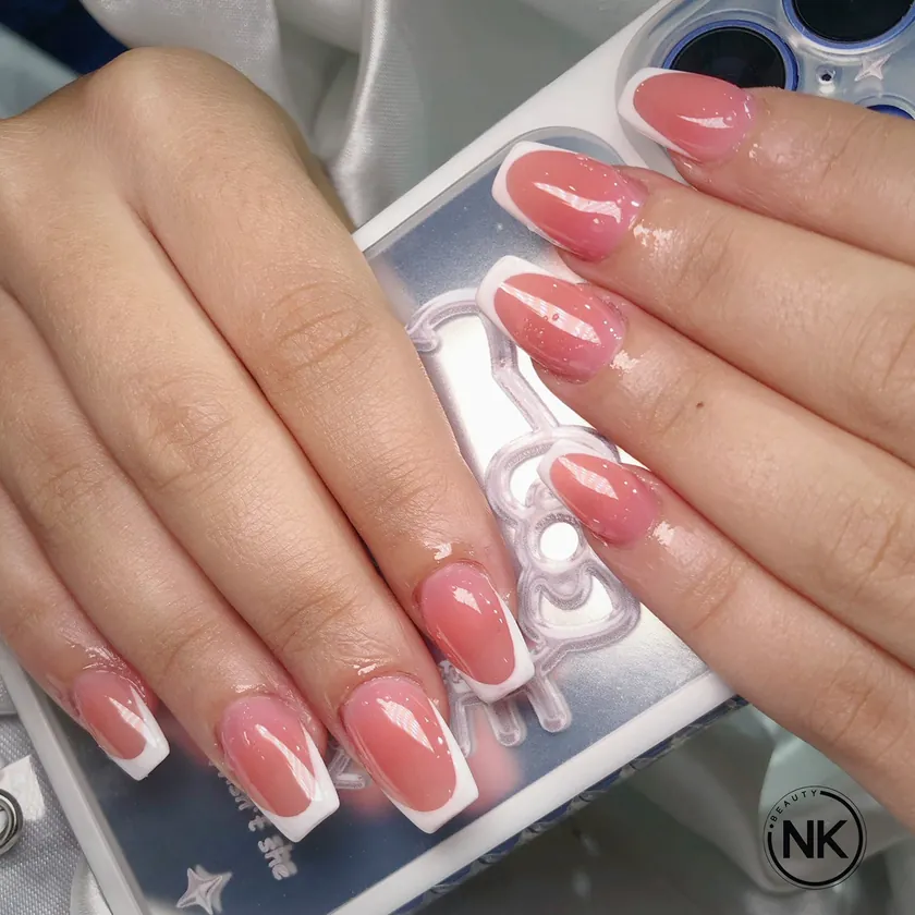 Nail work at NK Beauty: Pink French manicure with white tips