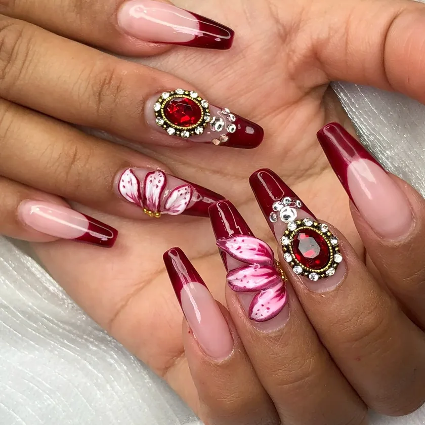 Nail work at NK Beauty: Burgundy French with jewel and floral art