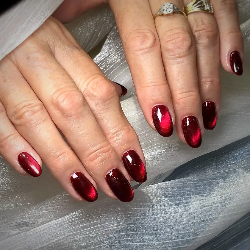 Nail work at NK Beauty: Deep red chrome nails