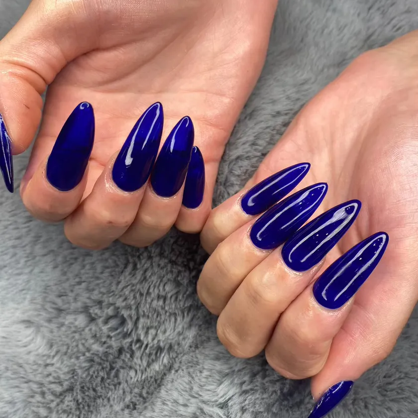 Nail work at NK Beauty: Navy blue stiletto extensions