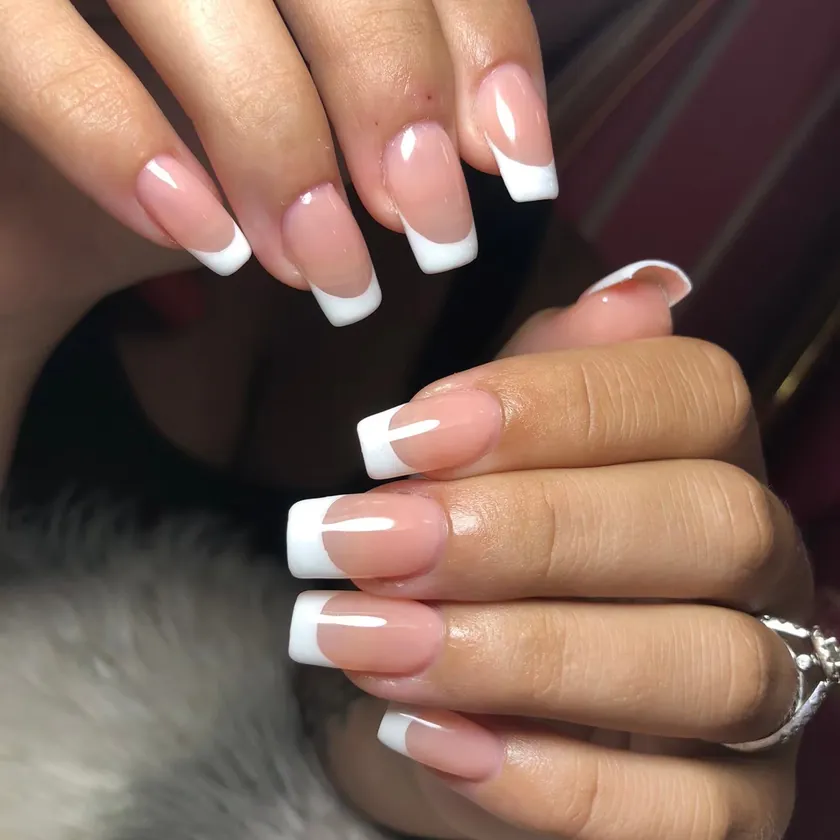 Nail work at NK Beauty: Classic white French on square nails