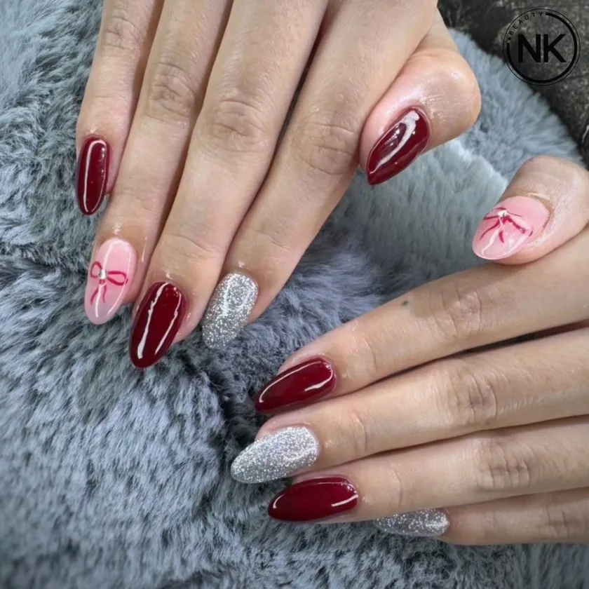 Nail work at NK Beauty: Burgundy and silver with a floral accent