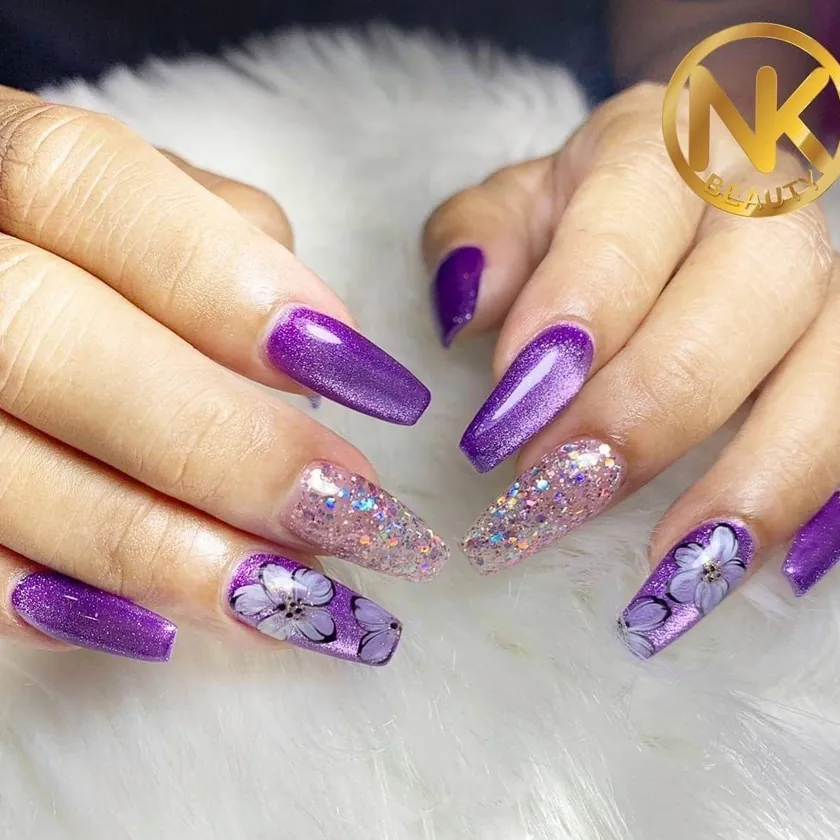 Nail work at NK Beauty: Purple nails with floral art