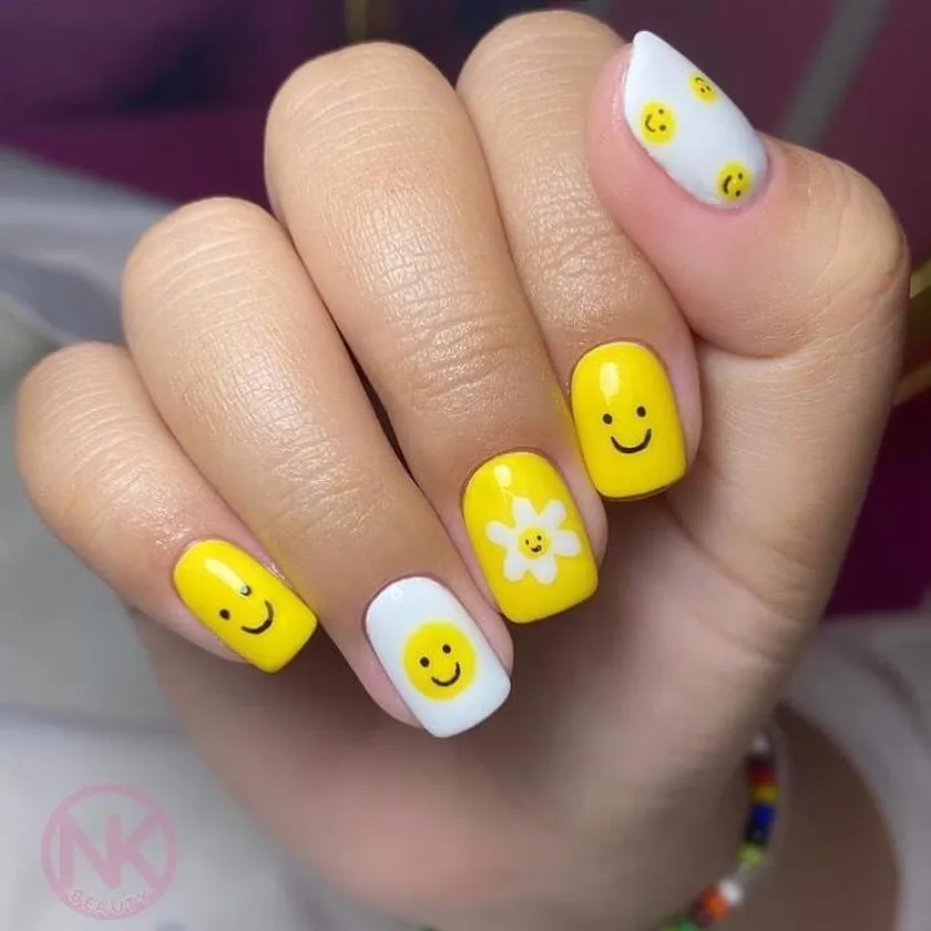 Nail work at NK Beauty: Yellow smiley nail art